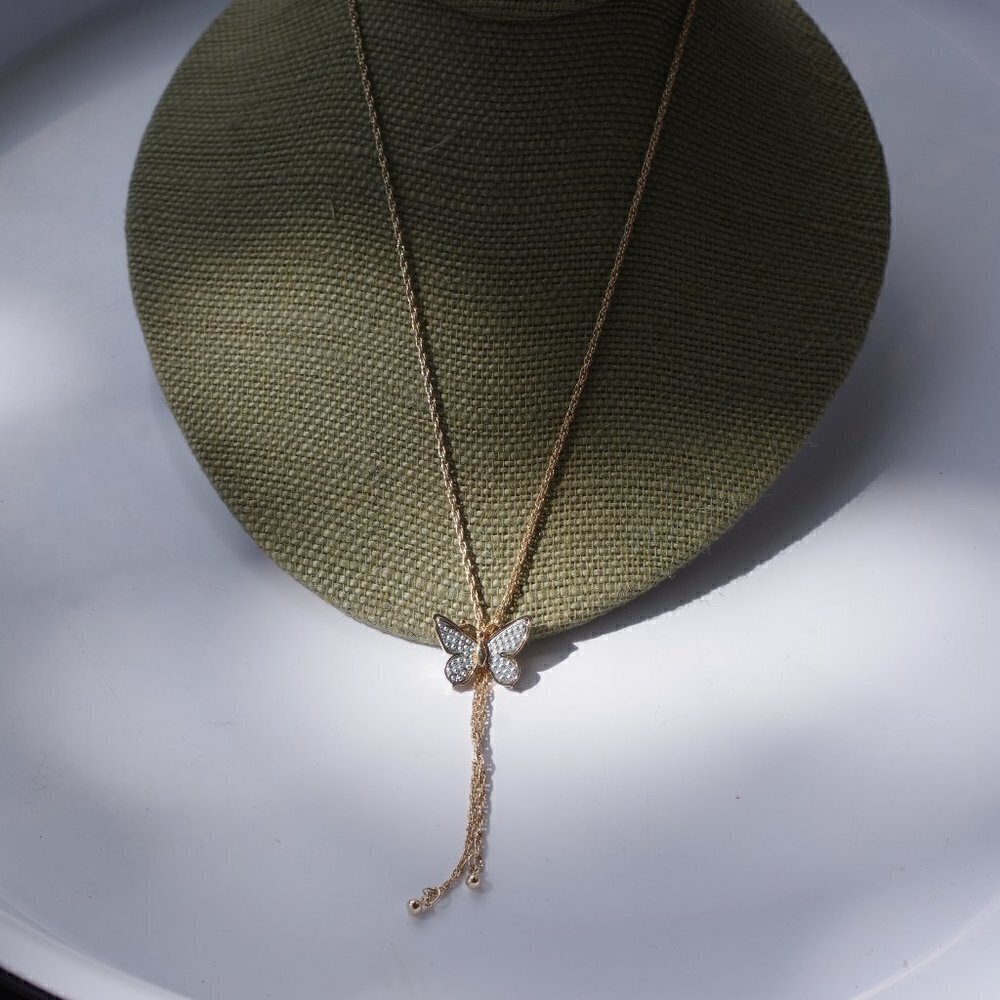 Women`s gold/silver tone butterfly lariat necklace